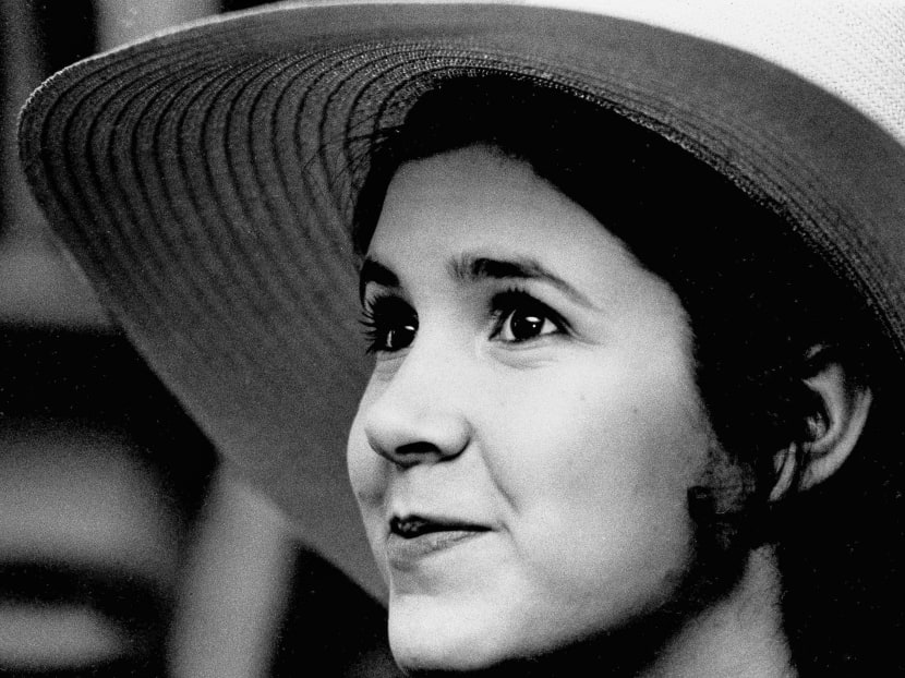 Carrie Fisher, 16-year-old daughter of Debbie Reynolds and Eddie Fisher, says it's a hassle to be judged as the daughter of celebrities. But being Debbie Reynolds' daughter admittedly has helped her get her present job in the chorus of Irene, in which her mother stars on Broadway. She is pictured in New York, May 2, 1973. Photo: AP
