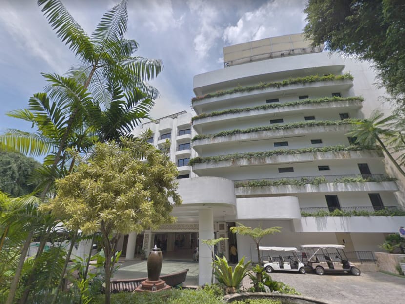 Jin Chensu is accused of leaving a hotel room in Shangri-la Rasa Sentosa (pictured) without a face mask on, climbing up to the balcony of another room and staying there for about five minutes.