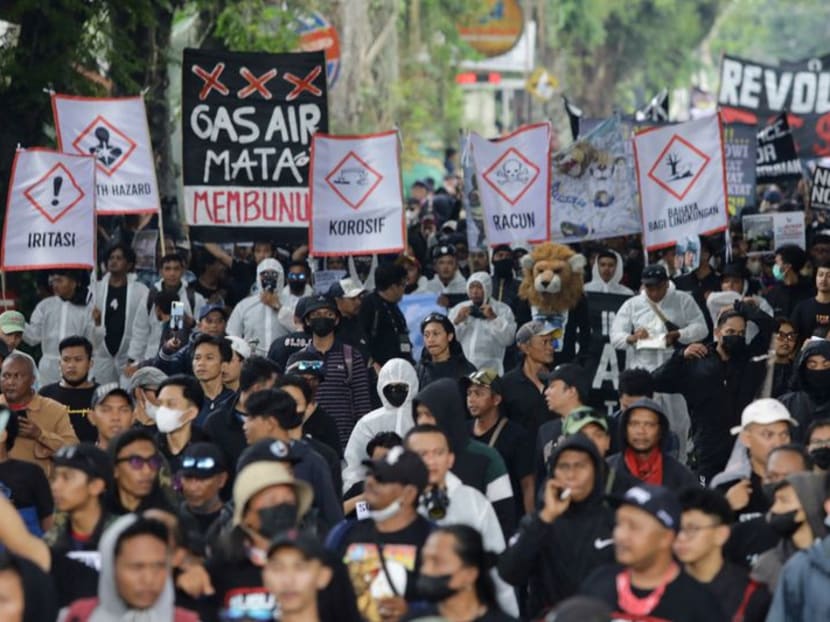Indonesians march for justice after deadly soccer stampede Indonesians march for justice after deadly soccer stampede