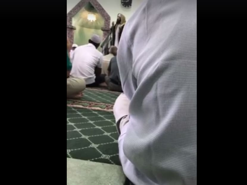 Screencap of a video posted on A Muslim Convert Once More Facebook page showing the imam speaking in Arabic at Masjid Jamae (Chulia).