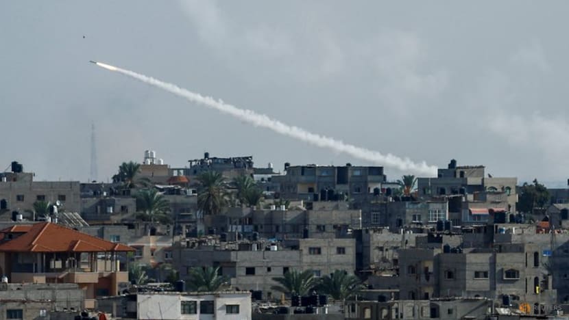 Israeli forces clash with Hamas gunmen after hundreds killed