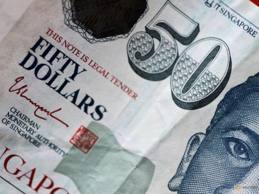 FILE PHOTO: A Singapore dollar note is seen in this illustration photo. FILE PHOTO: A Singapore dollar note is seen in this illustration photo.