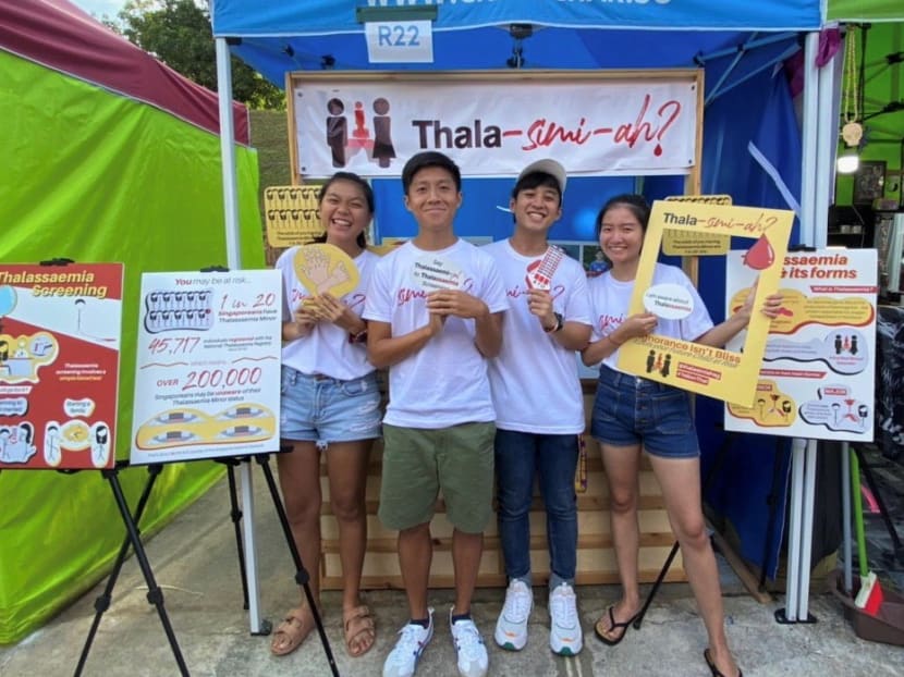 The author (second from left) at a roadshow at Chatuchak Night Market Singapore in February to promote awareness of thalassaemia, a genetic blood disorder.