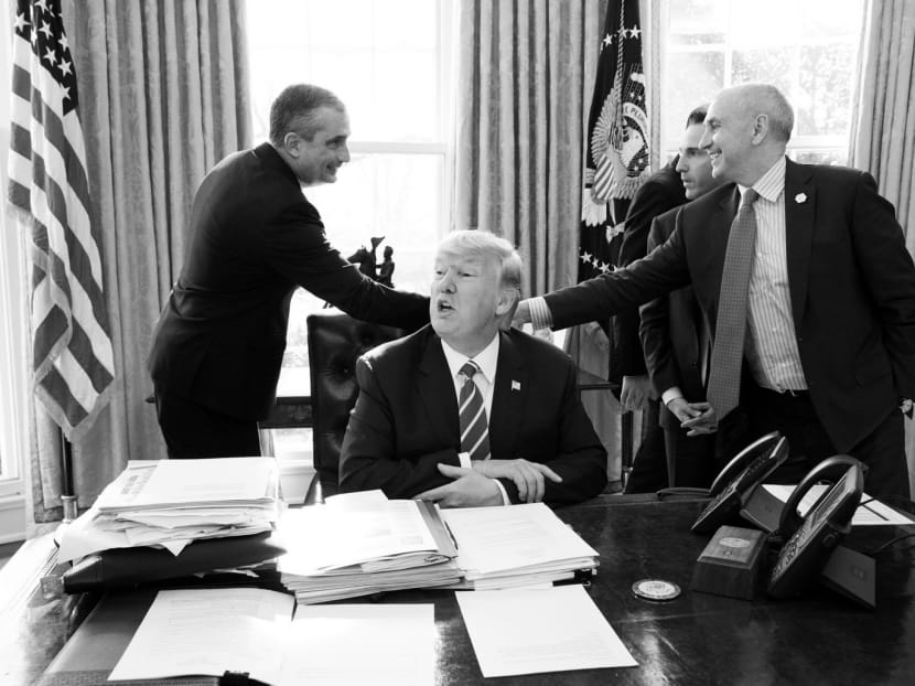 President Donald Trump at his desk after a meeting with Intel CEO Brian Krzanich (left) and members of his staff in the White House in Washington on Wednesday. The new administration could find it hard to manage a crisis, given its chaotic start. Photo: AP