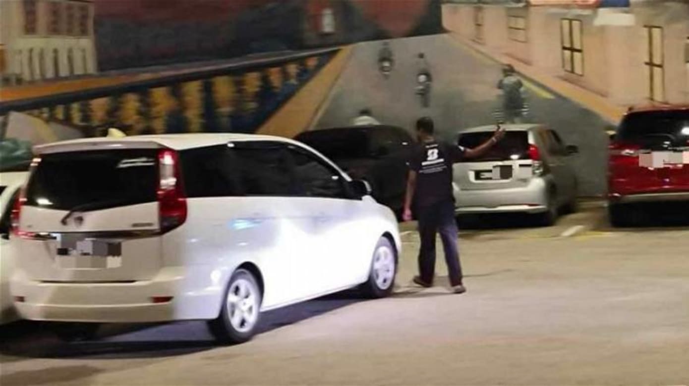 在马六甲旅游区非法收停车费 五男女被逮捕