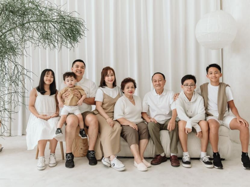 Mrs Celine Ng (fifth from right) with her family in a photo taken in a studio. Mrs Celine Ng (fifth from right) with her family in a photo taken in a studio.