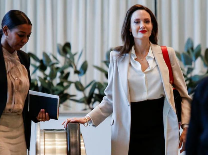 Angelina Jolie drops Pitt from her last name following divorce CNA