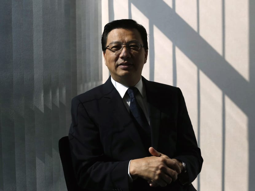 Malaysian Minister of Transport Liow Tiong Lai poses for a photograph ahead of the one-year anniversary of the disappearance of Malaysia Airlines flight MH370 in Putrajaya, on March 6, 2015. Photo: Reuters