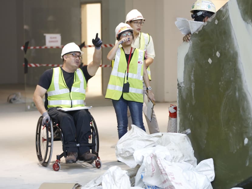 Richard Kuppusamy, a wheelchair-bound architect working on a project. Photo: Raj Nadarajan/TODAY