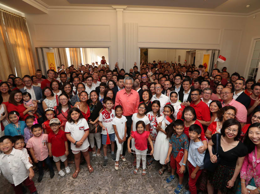 Prime Minister Lee Hsien Loong with about 300 overseas Singaporeans and their families in Paris on Saturday (July 14).