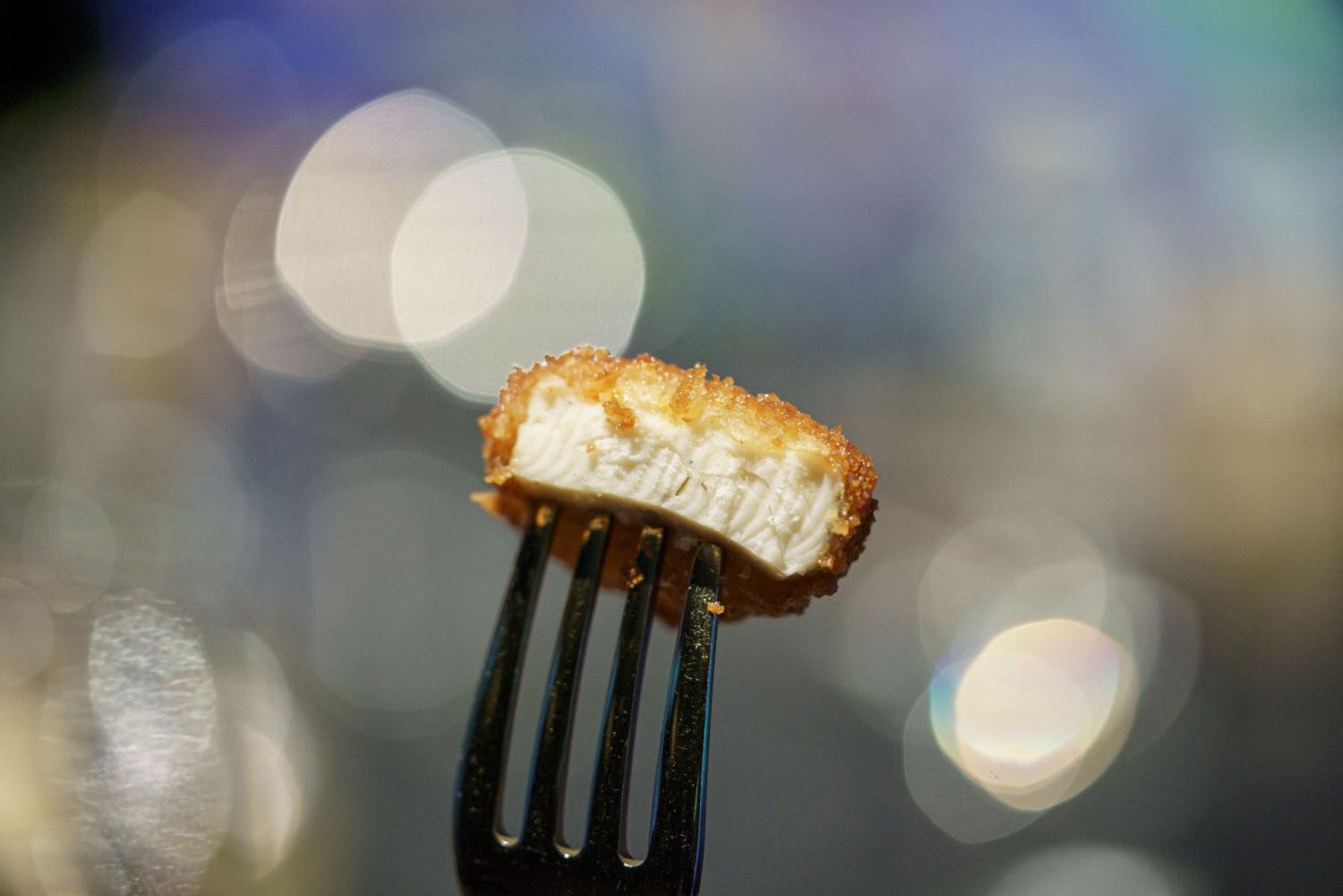 A nugget made from lab-grown chicken meat shown at a media presentation in December 2020 in Singapore, the first country to allow the sale of such cell-cultured meat. A nugget made from lab-grown chicken meat shown at a media presentation in December 2020 in Singapore, the first country to allow the sale of such cell-cultured meat.