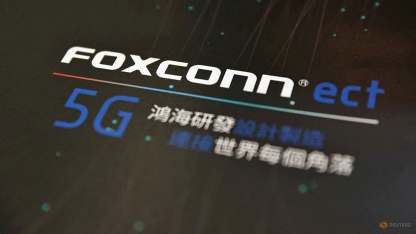 Taiwan weighs fining Foxconn over China chip investment - source Taiwan weighs fining Foxconn over China chip investment - source