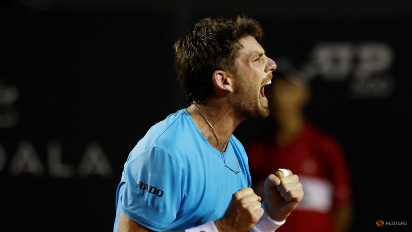 Britain's Norrie flips the script to beat Alcaraz in Rio final Britain's Norrie flips the script to beat Alcaraz in Rio final