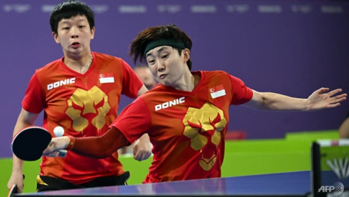 Singapore’s Feng Tianwei and Zeng Jian win table tennis doubles gold at