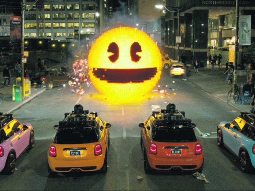 Pac-Man attacking our world with a smile in Pixels