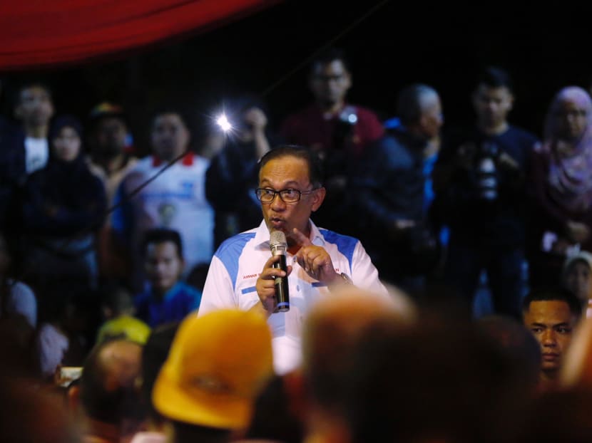 Datuk Seri Anwar Ibrahim speaking at his last rally in Port Dickson on Oct 12, 2018 before his win in the by-election.