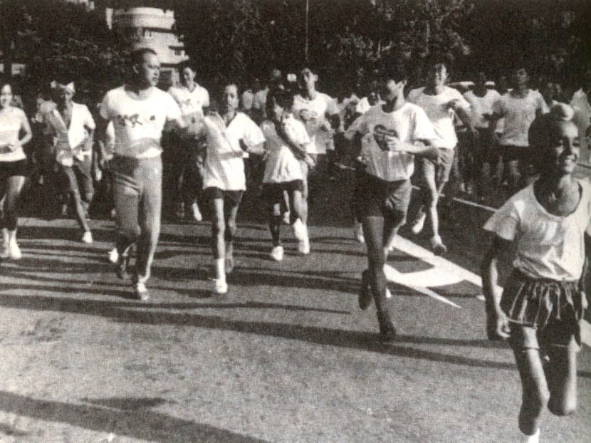 Othman Wok leading joggers on a 3-mile trek during the Sports for All Campaign in 1976. Photo: From the book, Never in My Wildest Dream