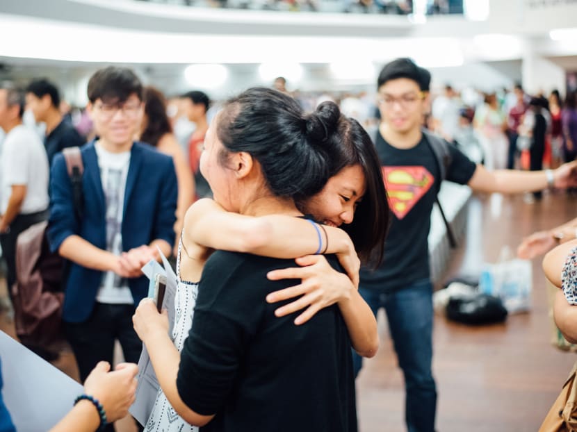 Students from Anglo-Chinese School (Independent) hug each other after receiving their results for the International Baccalaureate (IB) diploma examinations on Jan 5, 2016. Photo: Anglo-Chinese School (Independent)