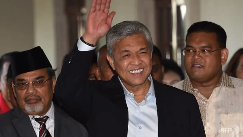 UMNO president Ahmad Zahid hands over power to deputy UMNO president Ahmad Zahid hands over power to deputy