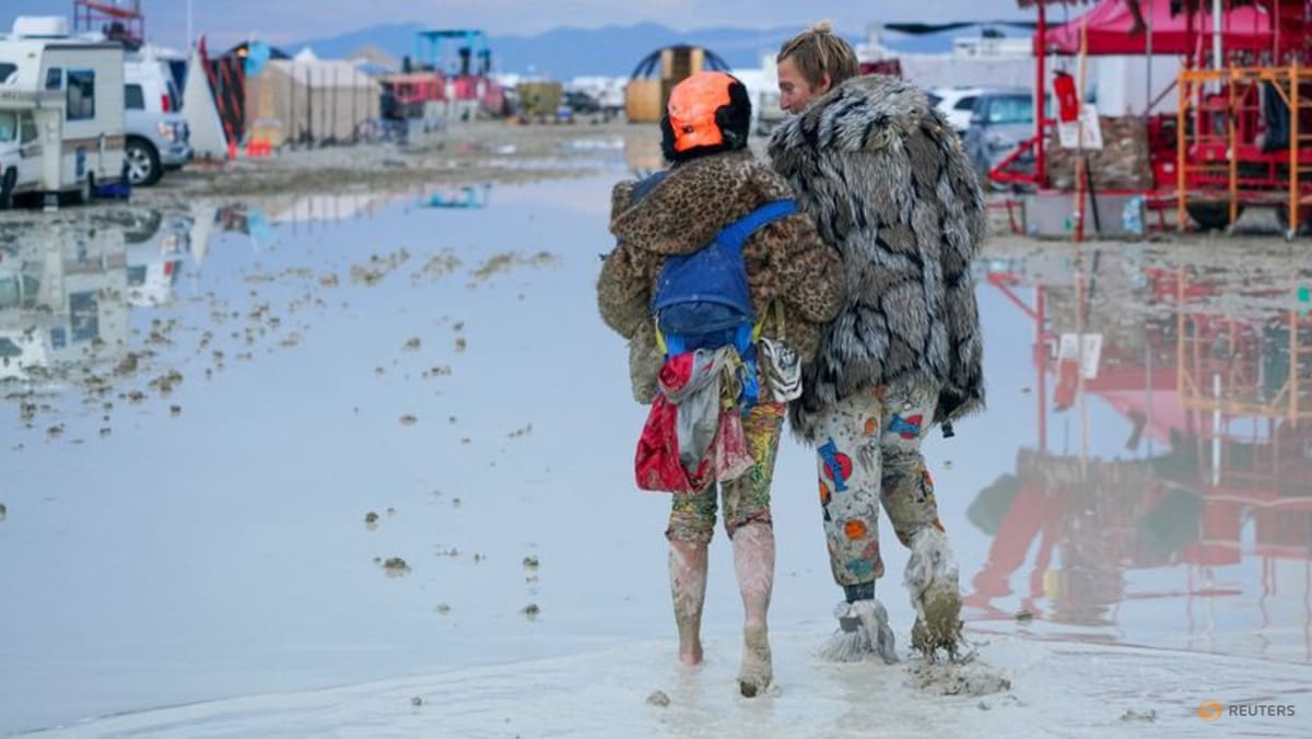 Burning Man revellers unfazed by deluge and deep mud TODAY