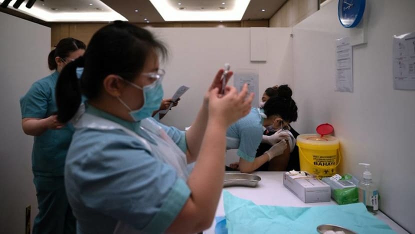 Malaysia's new COVID-19 cases cross 20,000 mark for first time, setting record for 2nd day Malaysia's new COVID-19 cases cross 20,000 mark for first time, setting record for 2nd day