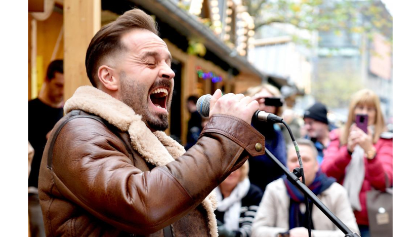 Aflie Boe surprises shoppers by busking in city centre