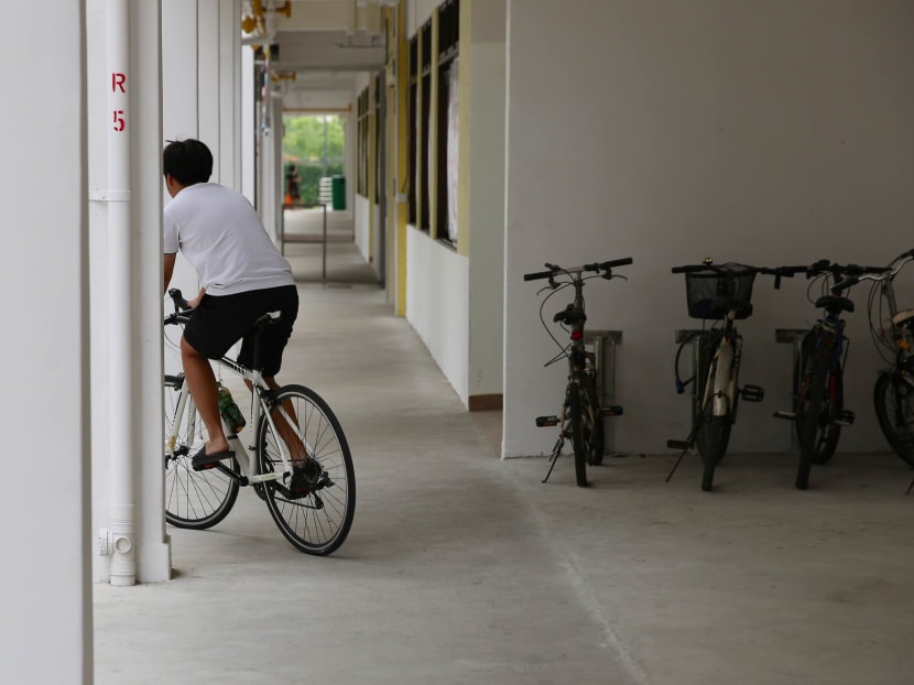 Less than two weeks into the ban, some parents interviewed said they are unsure if teaching their children to ride a bicycle at their void deck is allowed.