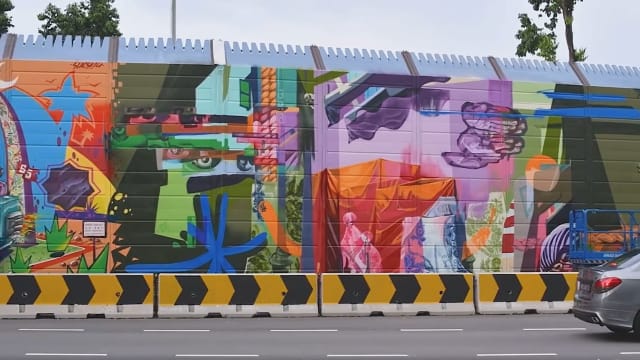 隔音屏障成画布！甘榜格南238米长街头艺术诞生