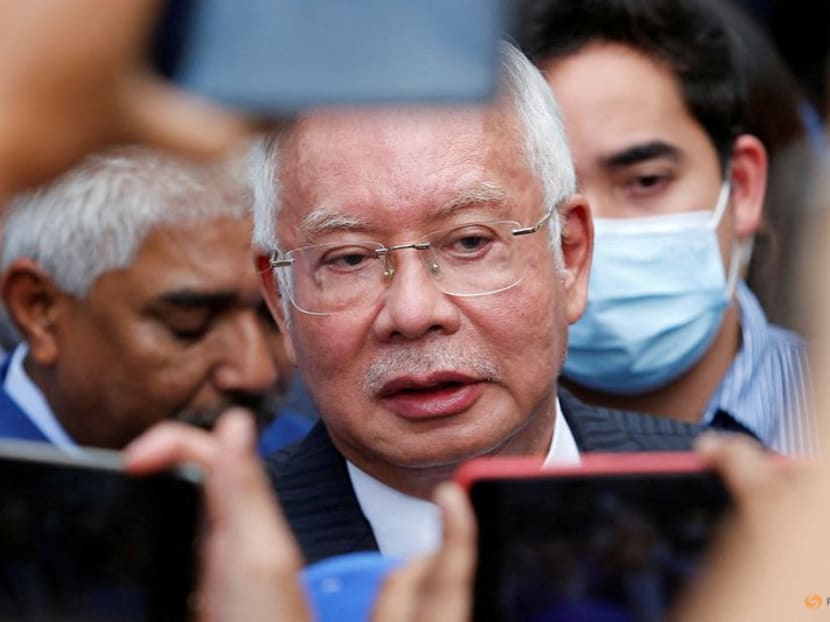 FILE PHOTO: Former Malaysian Prime Minister Najib Razak speaks to journalists outside the Federal Court during a court break, in Putrajaya, Malaysia August 23, 2022. REUTERS/Lai Seng Sin    