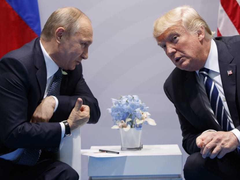 US President Donald Trump meets with Russian President Vladimir Putin at the G20 Summit, Friday, July 7, 2017, in Hamburg. AP file photo