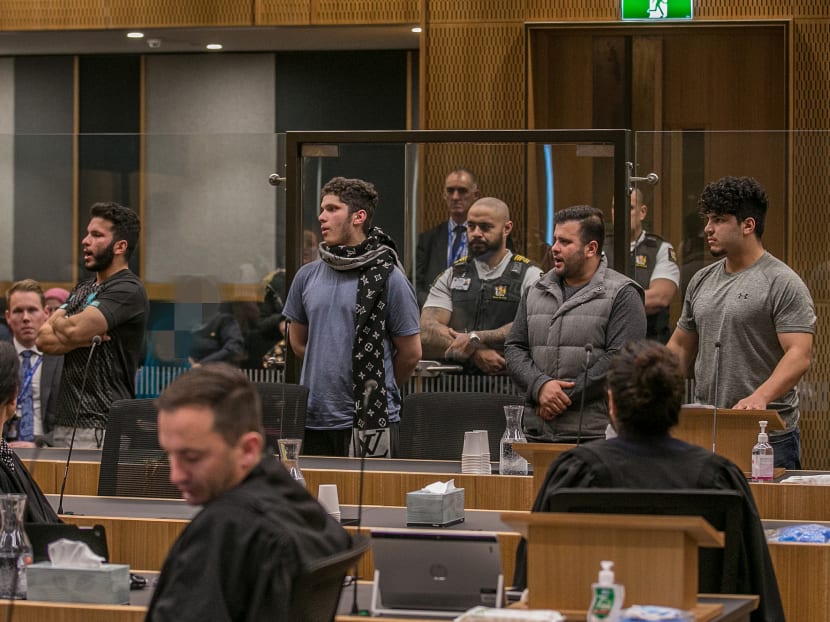 Mr Jibran Safi (extreme right), whose father Matiullah Safi was killed by Australian white supremacist Brenton Tarrant, chants with his brothers towards Tarrant during victim impact statements on Tarrant's third day in court for a sentence hearing in Christchurch on Aug 26, 2020.
