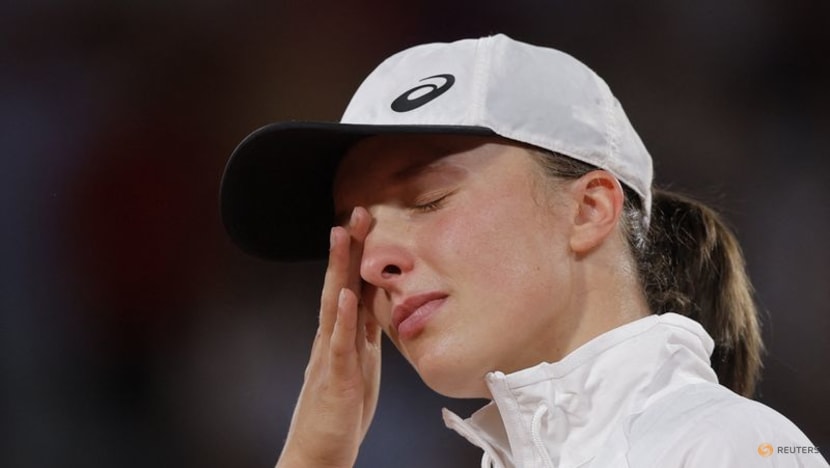 French Open champion Swiatek is 'overwhelmed' by Lewandowski support French Open champion Swiatek is 'overwhelmed' by Lewandowski support
