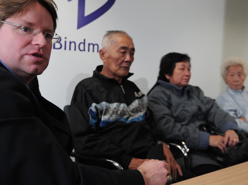 Mr John Halford, a solicitor representing relatives of unarmed Malaysian rubber plantation workers killed in Batang Kali in 1948, speaks during a press conference with Lim Ah Yin (2nd left), Chong Koon Ying (3rd left) and Lim Ah Yin (right) in London on May 7, 2012 ahead of their High Court bid to force a public inquiry into the killings. Photo: AFP