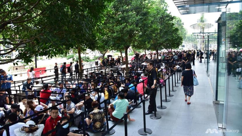 Hundreds queue outside Apple store at Orchard Road a day before launch of new iPhones Hundreds queue outside Apple store at Orchard Road a day before launch of new iPhones