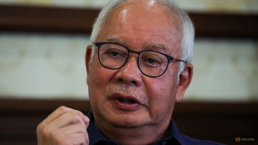 Malaysian court releases convicted ex-PM Najib's passport for trip to Singapore Malaysian court releases convicted ex-PM Najib's passport for trip to Singapore