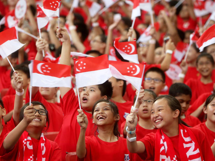 Students of different races at a National Day Parade rehearsal. The vast majority of respondents of a survey commissioned by Channel NewsAsia and the Institute of Policy Studies said they embrace multiculturalism and live by a multicultural ethos. TODAY file photo