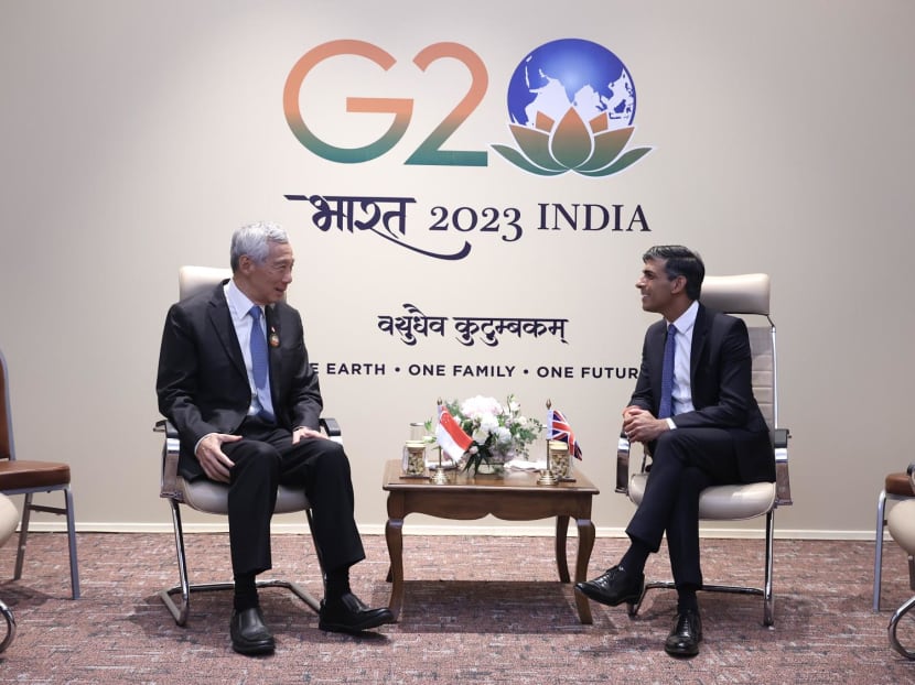 Singapore Prime Minister Lee Hsien Loong (left) and British Prime Minister Rishi Sunak at the sidelines of the G20 Leaders' Summit in New Delhi, India.