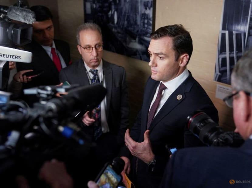 FILE PHOTO: Republican U.S. Rep. Mike Gallagher (R-WI) speaks to reporters after a Republican caucus meeting at the U.S. Capitol in Washington, U.S., January 3, 2023. REUTERS/Nathan Howard/File Photo