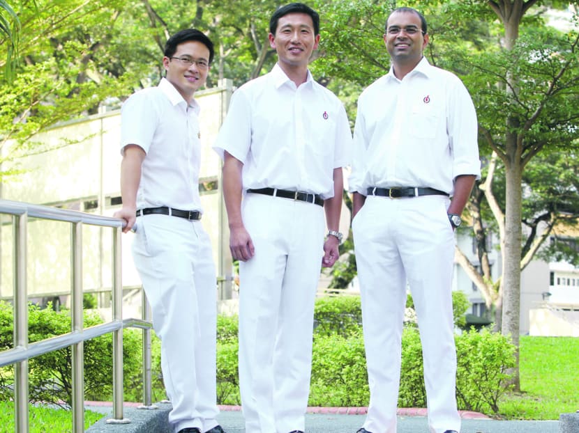 (From left) Mr Desmond Choo, Mr Ong Ye Kung and Dr Janil Puthucheary were introduced as PAP candidates in the 2011 General Election. TODAY file photo
