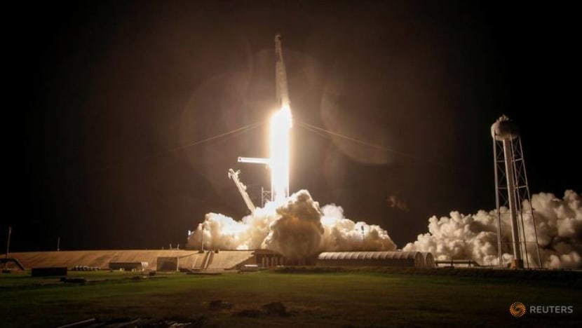 SpaceX capsule, carrying four astronauts, docks with International Space Station SpaceX capsule, carrying four astronauts, docks with International Space Station