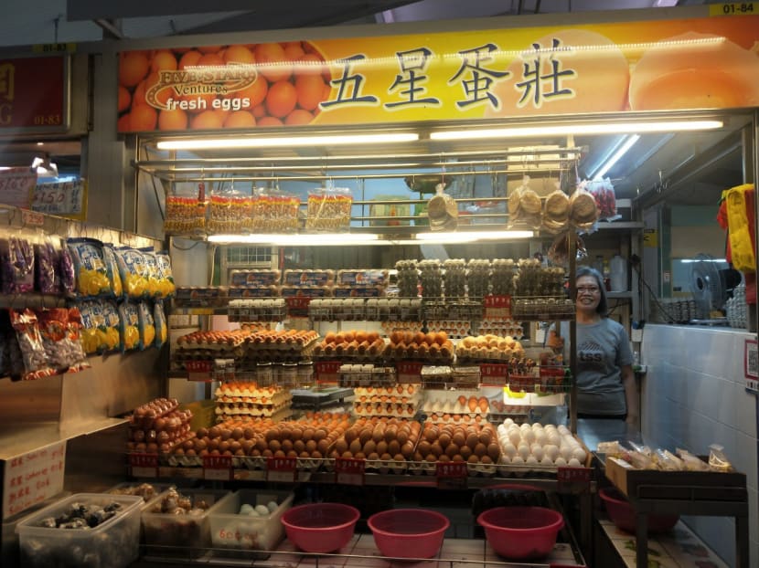 Mdm Christine Yew, 59, makes her egg stall “brighter and neater” to attract younger customers.