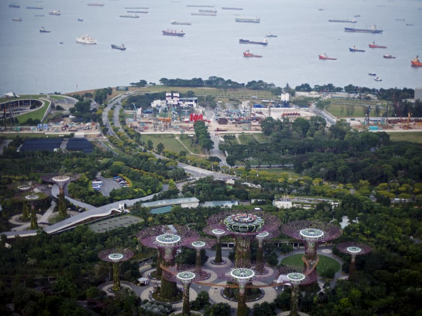 Ships pass by the man-made coastline of Singapore, July 16, 2015. Data from the Singapore Land Authority showed that Singapore had grown to 724.2 square kilometres in 2018 as compared to its land size of 581.5 square kilometres in 1959 — a 24 per cent increase. Ships pass by the man-made coastline of Singapore, July 16, 2015. Data from the Singapore Land Authority showed that Singapore had grown to 724.2 square kilometres in 2018 as compared to its land size of 581.5 square kilometres in 1959 — a 24 per cent increase.