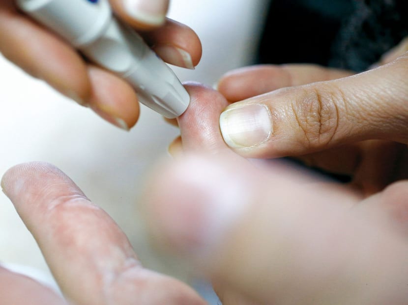 Pricking the finger to check blood sugar may become a thing of the past. Photo: Reuters