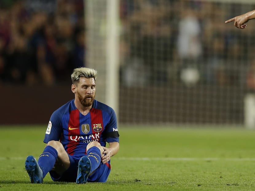 FC Barcelona's Lionel Messi pauses during the Spanish La Liga soccer match between FC Barcelona and Atletico Madrid at the Camp Nou in Barcelona, Spain, on Sept 21, 2016. Photo: AP
