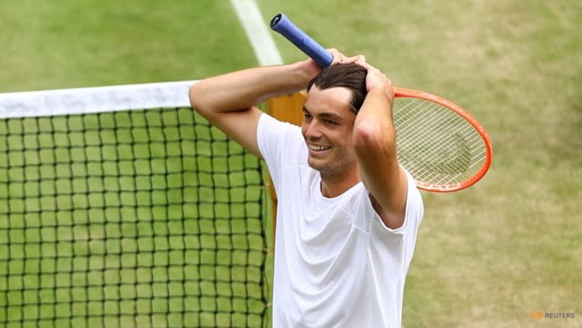 Fritz flies into Wimbledon quarters to earn family stripes Fritz flies into Wimbledon quarters to earn family stripes