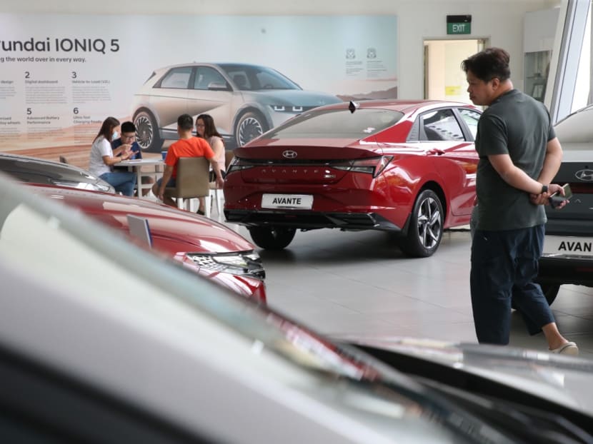 Customers at authorised distributor Komoco Motors’ showroom looking at Hyundai cars on display on Oct 9, 2022. Customers at authorised distributor Komoco Motors’ showroom looking at Hyundai cars on display on Oct 9, 2022.