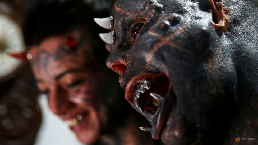 'The sinister attracted me': Brazilian tattoo artist morphs into devil look-alike