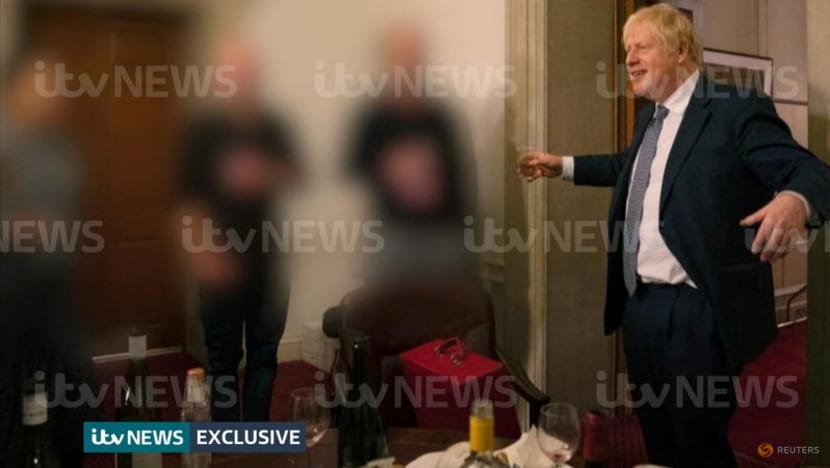Fresh photos of UK PM Johnson drinking reignite 'Partygate' row