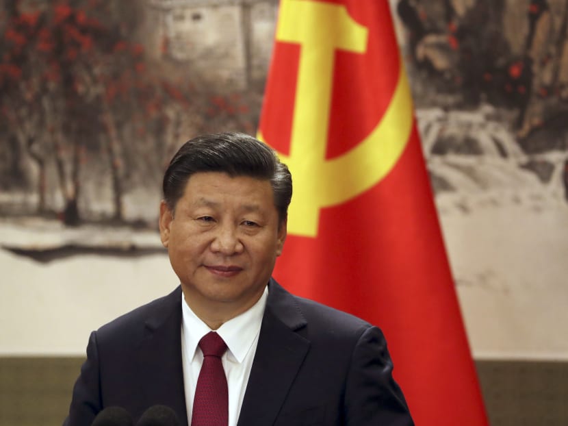 Xi Jinping attends a press event at Beijing's Great Hall of the People. Photo: AP