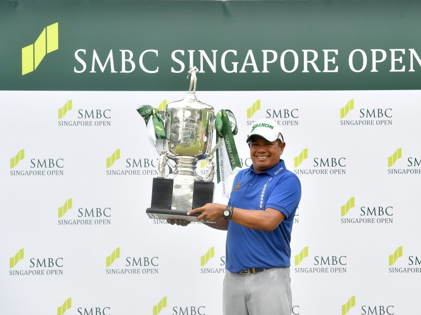 Prayad Marksaeng of Thailand pictured with the winner’s trophy on Sunday after the final round of the SMBC Singapore Open at Sentosa Golf Club's Serapong Course. Photo: Paul Lakatos/Lagardère Sports